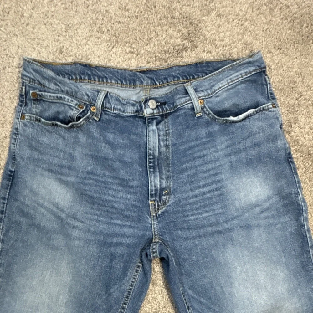 Levi's Men's Blue Denim Jeans Medium Wash Tapered‎ 5-Pocket Logo Cotton